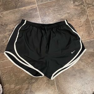 Black Nike running shorts